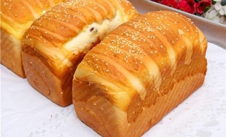La struttura superiore del pane del gel dell'apprendista giallastro del pane ha amplificato ammorbidire rapido del volume del pane